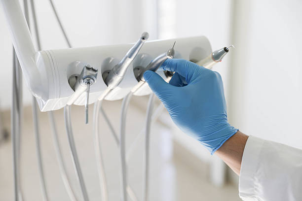 Professional Tooth Extraction technician working in Marco Island, FL